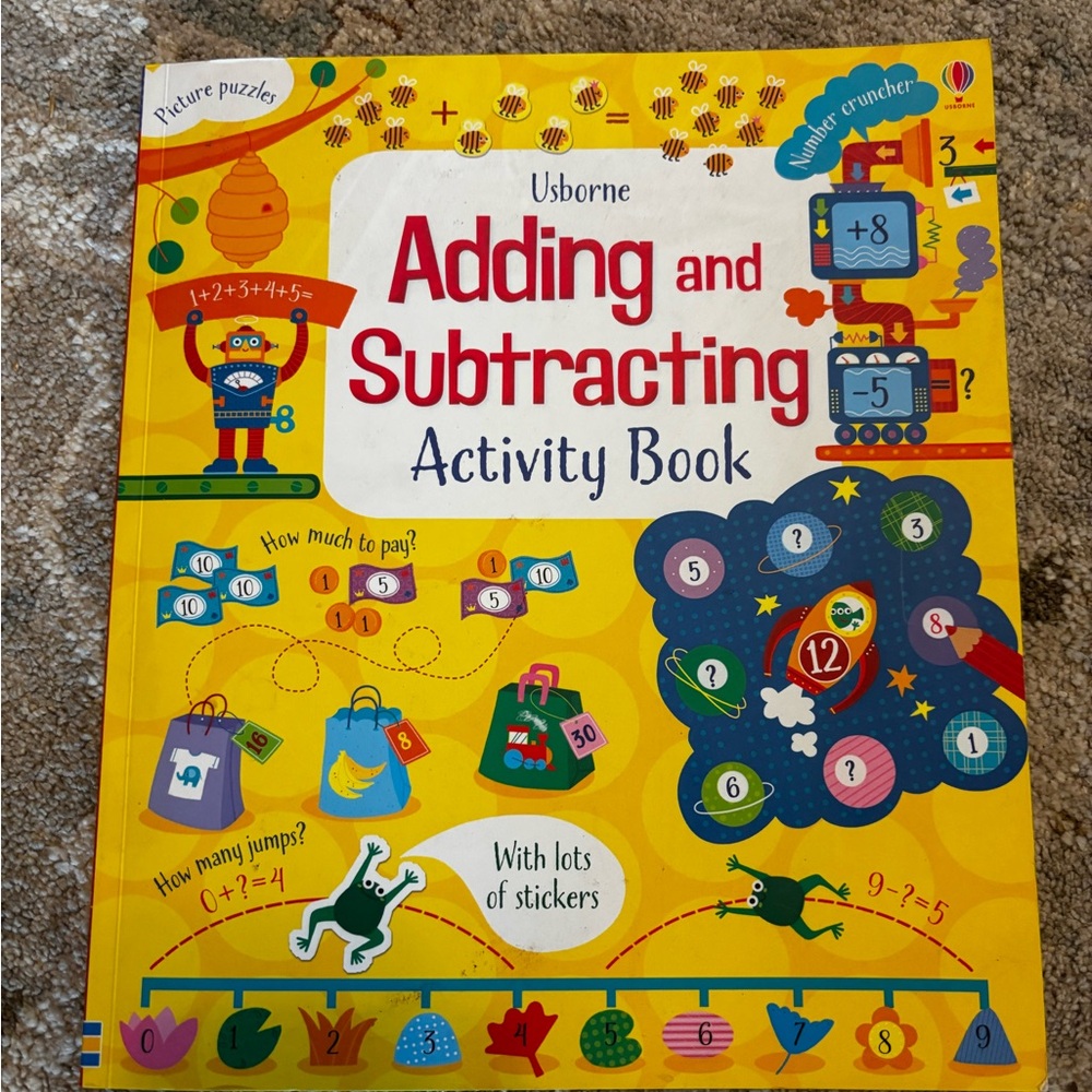 Usborne Adding and Subtracting Activity Book